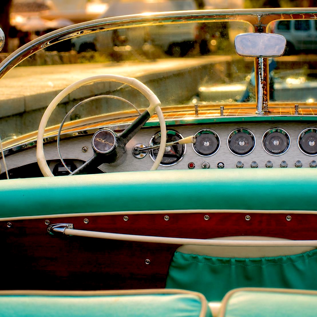 Classic Riva Ariston wooden boat available for private charter experiences across Italy