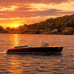 Vintage Riva Ariston cruising at sunset during an exclusive private experience